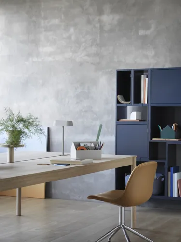 Linear System Modular Table in Oak, Linear Lamp Series, Linear System Tray, Fiber Side Chair Swivel Base in Aluminum & Cognac Refine Leather, Stacked Storage System in Midnight Blue