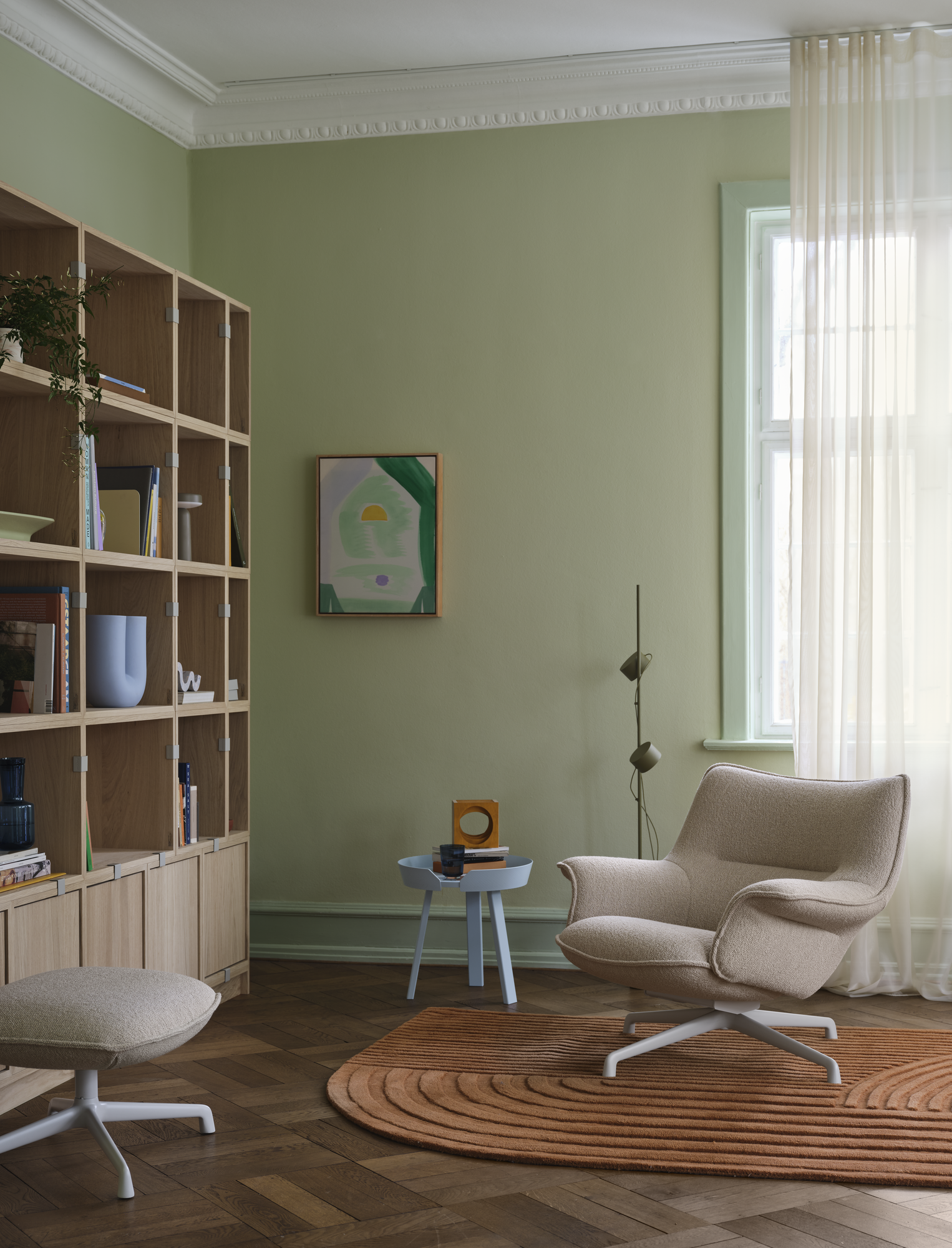 Doze Lounge Chair Low Back & Ottoman Swivel Base in Hearth 7/Grey - Stacked Bookcase Configuration 1 in Oak - Relevo Rug in Burnt Orange - Post Floor Lamp in Brown Green