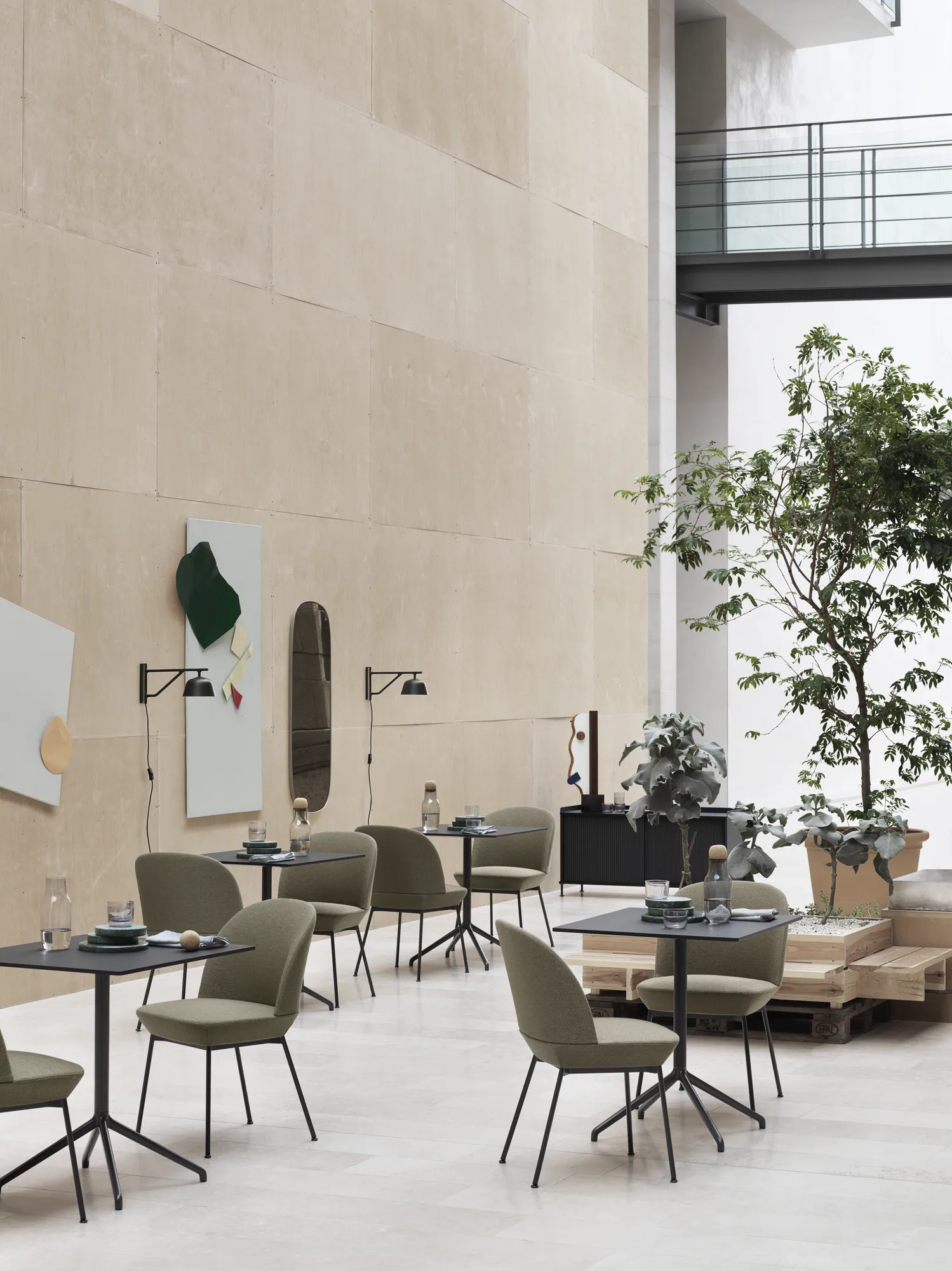 Oslo Side Chair Ocean 21/Anthracite Black, Still Café Table 75 x 65 H:73 Black/Black, Ambit Wall Lamp Black, Corky Carafe