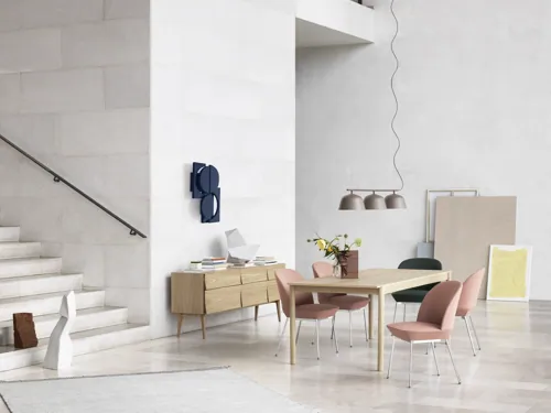 Reflect Sideboard, Oslo Side Chair - Twill Weave 530/Chrome, Oslo Side Chair - Twill Weave 990/Chrome,  Linear Wood Table 200 x 90 cm / 78.7 x 33.5, Ambit Rail Lamp - Taupe, Ply Rug - Off-White, Silent vase"