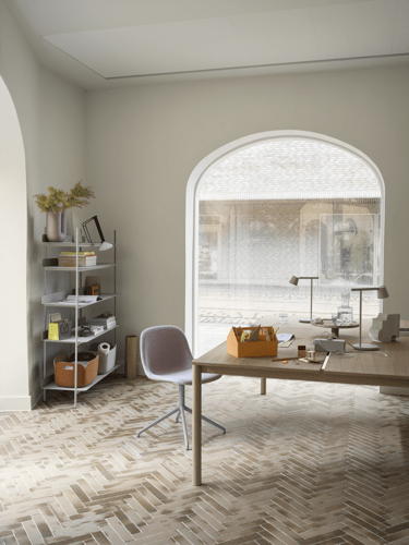 Sketch Toolbox in Burnt Orange - Fiber Side Chair w. Grey Swivel Base in Twill Weave 620 - Linear System Table in Oak - Tip Table Lamp in Grey - Piton Portable Lamp in Black