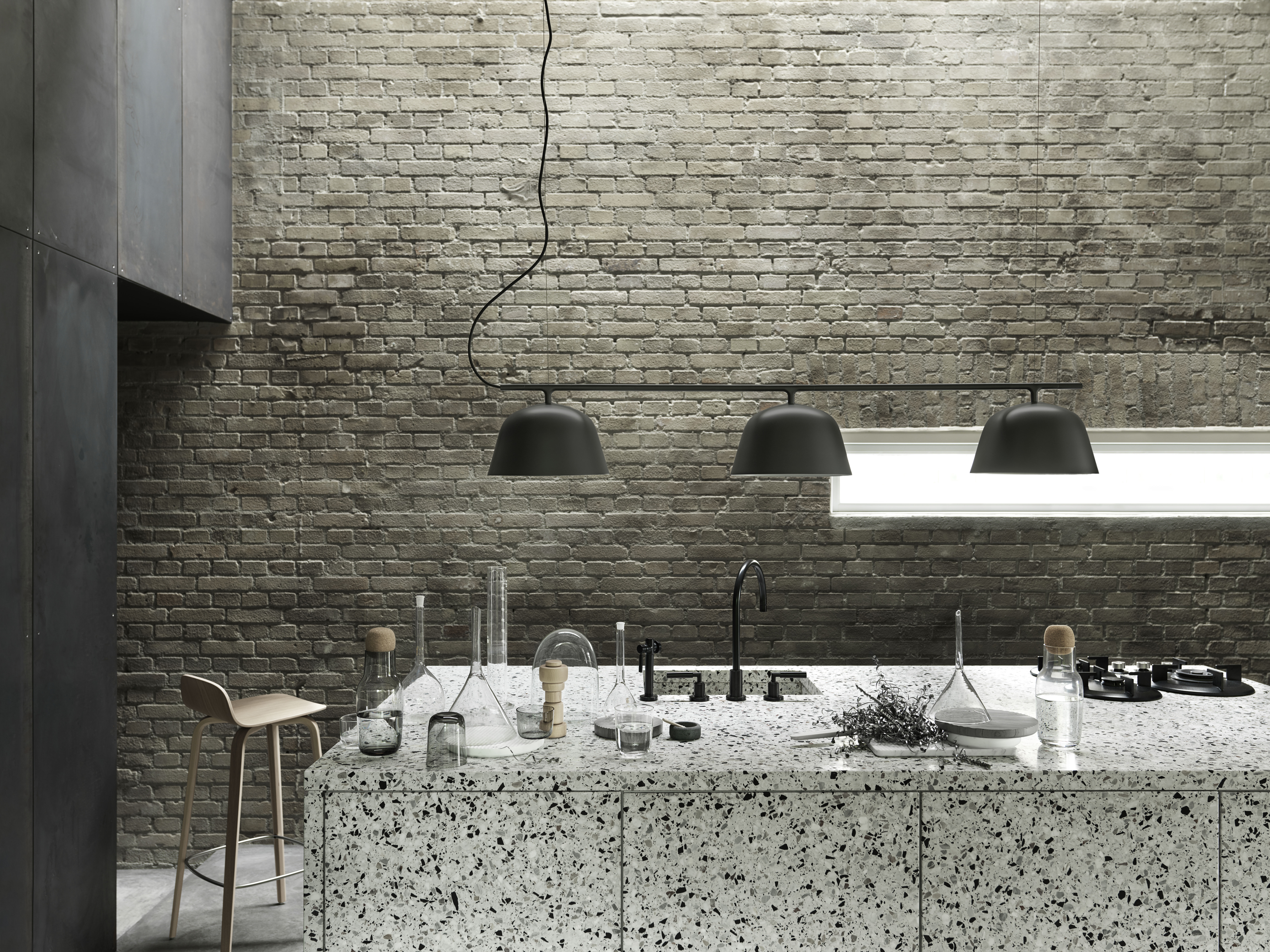 Ambit Rail Lamp - Black. Bisu Bar Stool - Oak. Corky Series - Clear, Grey.