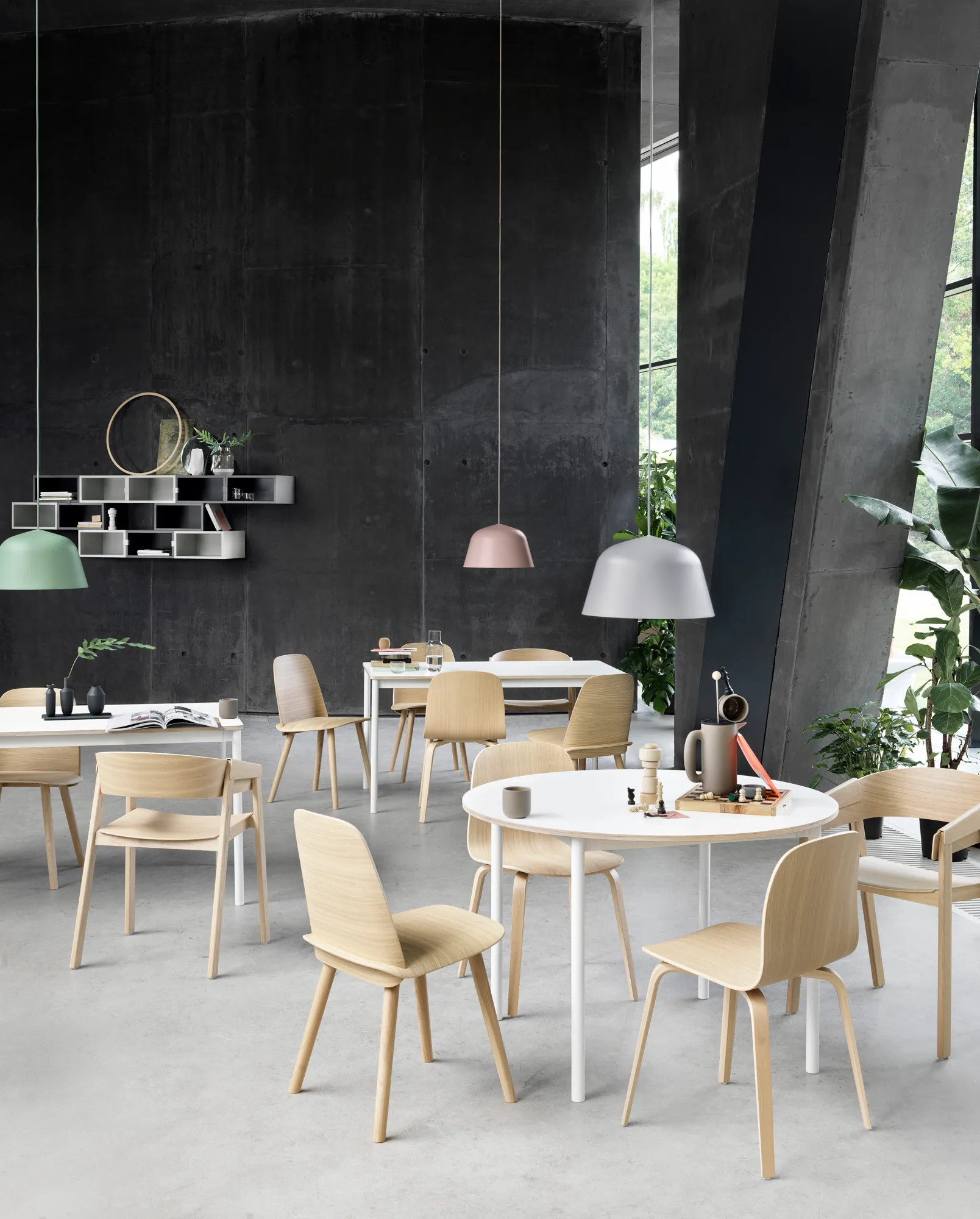 Nerd Chair - Oak. Cover Chair - Oak. Visu Chair - Oak. Base Round Table - White Laminate/Plywood/White. Base Table - White Laminate/Plywood/White. Ambit Pendant Lamp - Dusty Green, Rose, Grey. Stacked Grey, Light Grey.