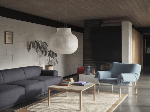 Connect Soft Modular Sofa 3-Seater Config. 1 Ecriture 780, Couple Coffee Table 80x84x40 in 1 Plain 1 Wavy Sand/Oak, Wrap Lounge Chair in Grey/Hero 732, Strand Pendant Ø60 cm, Echo Pouf in Vidar 542, Pebble Rug 170x240 in Burnt Orange