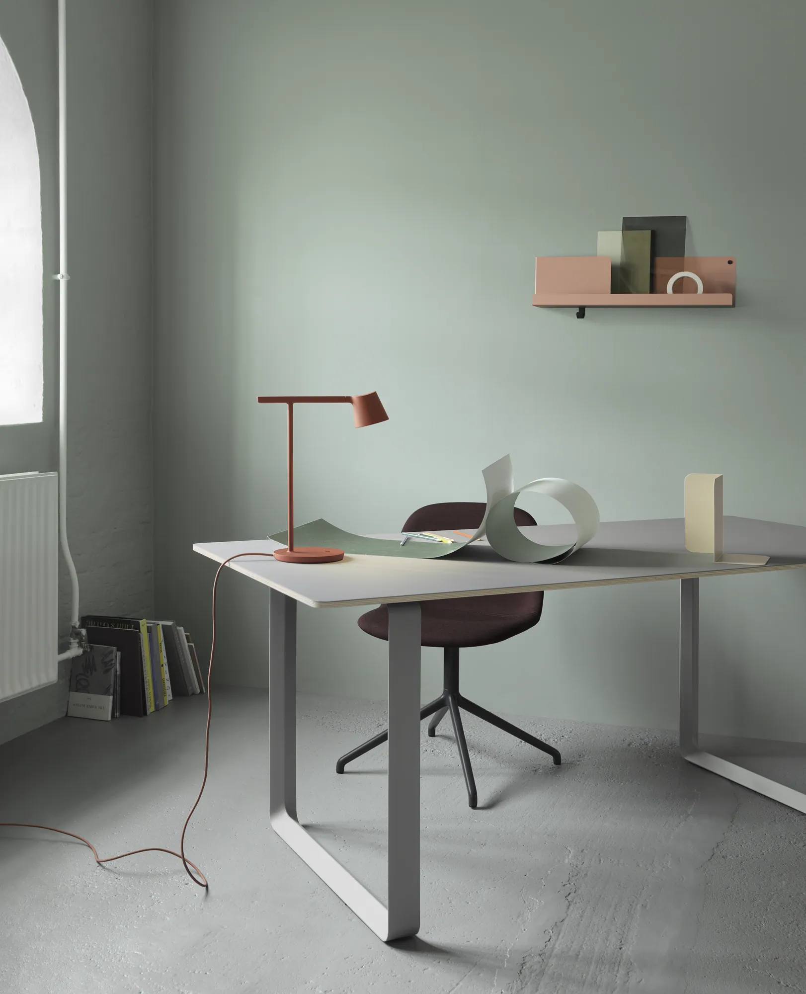 70/70 Table - Grey/Grey. Tip Table Lamp - Copper Brown. Fiber Side Chair - Remix 373/Black. Folded Shelves - Light Terracotta. Compile Bookend - Beige-Green.