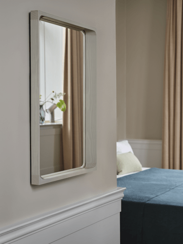 Arced Mirror in Grey - Beam Table Lamp in Aluminum - Silent Vase in Dark Green - Mingle Cushion in Light Green