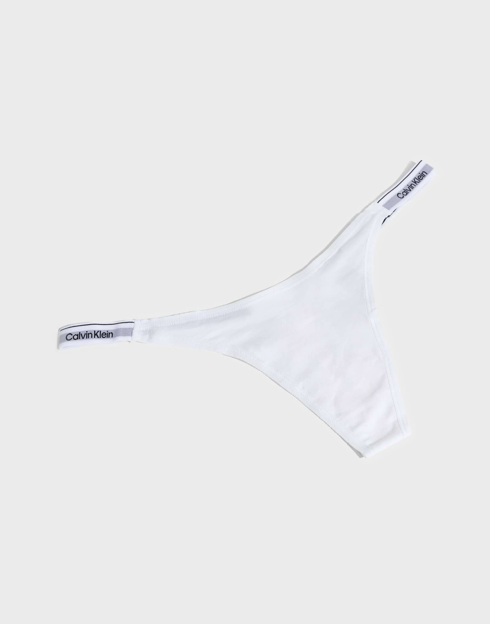 Osta Calvin Klein Underwear String Thong Dipped White