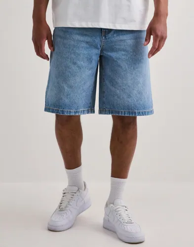 Blå jeansshorts från Woodbird med wide fit och femficksdesign