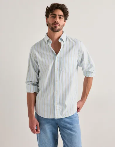 Gant blå randig oxfordskjorta med button down-krage och bröstficka