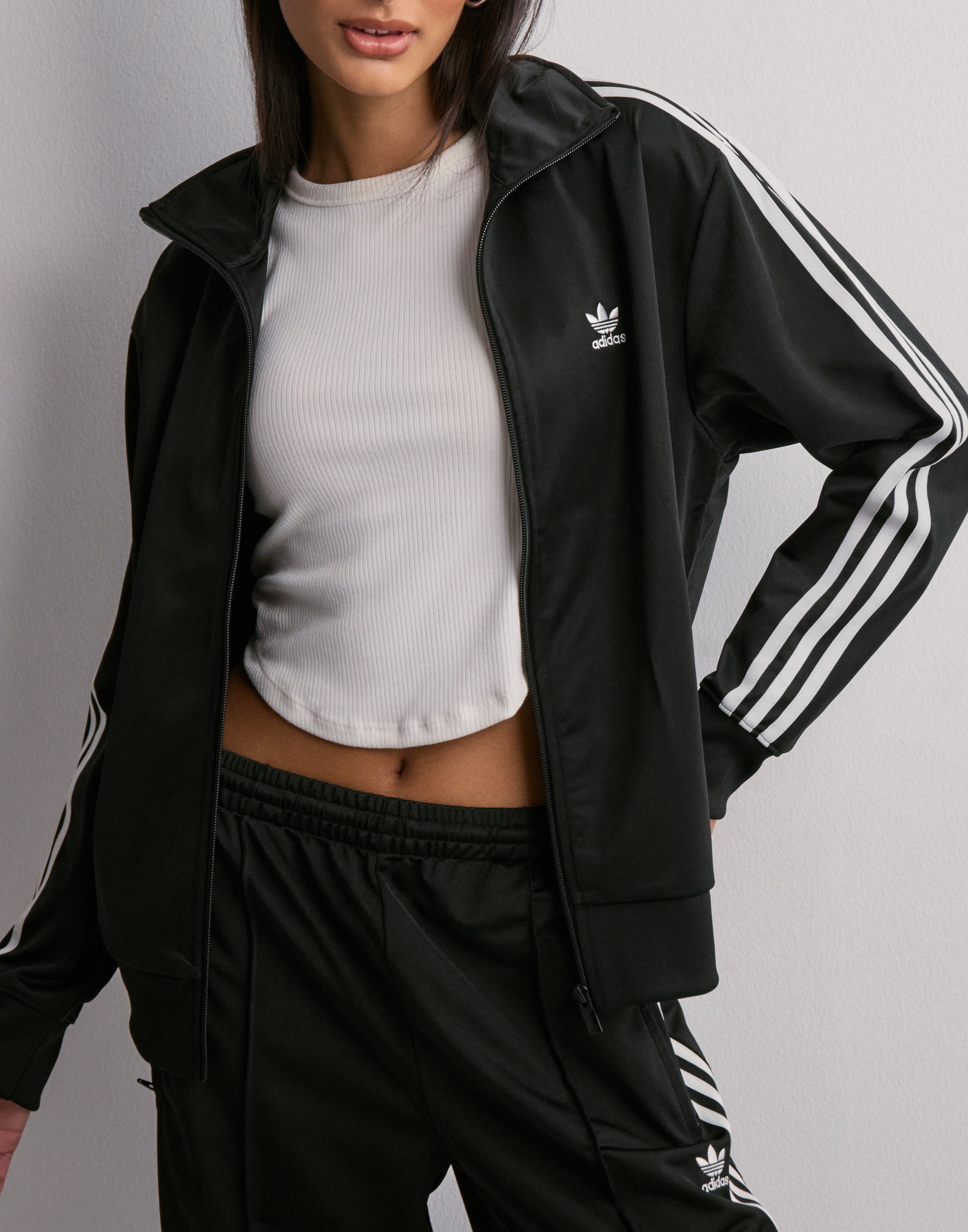 Buy Adidas Originals FIREBIRD TT - Black | Nelly.com