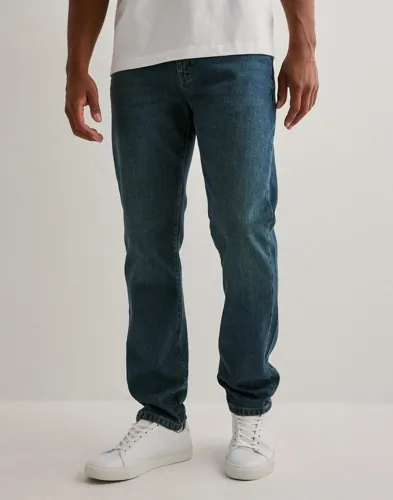 Woodbird straight jeans i blått med rak passform