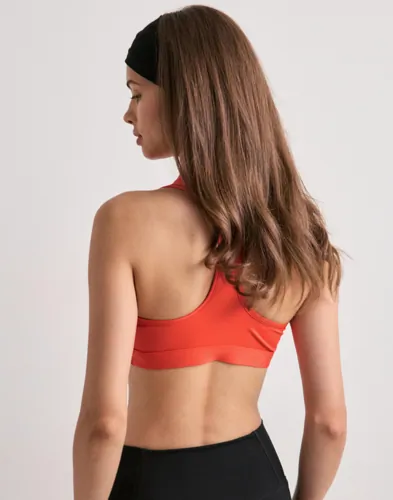 NIKE W Nk Swsh Med Spt Bra sport bh dam – bild 3