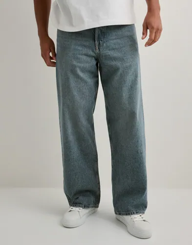 Blå Jack & Jones Dave jeans med wide fit och mid waist