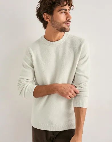 Vit sweatshirt från Samsøe Samsøe med rund hals och ribbade muddar