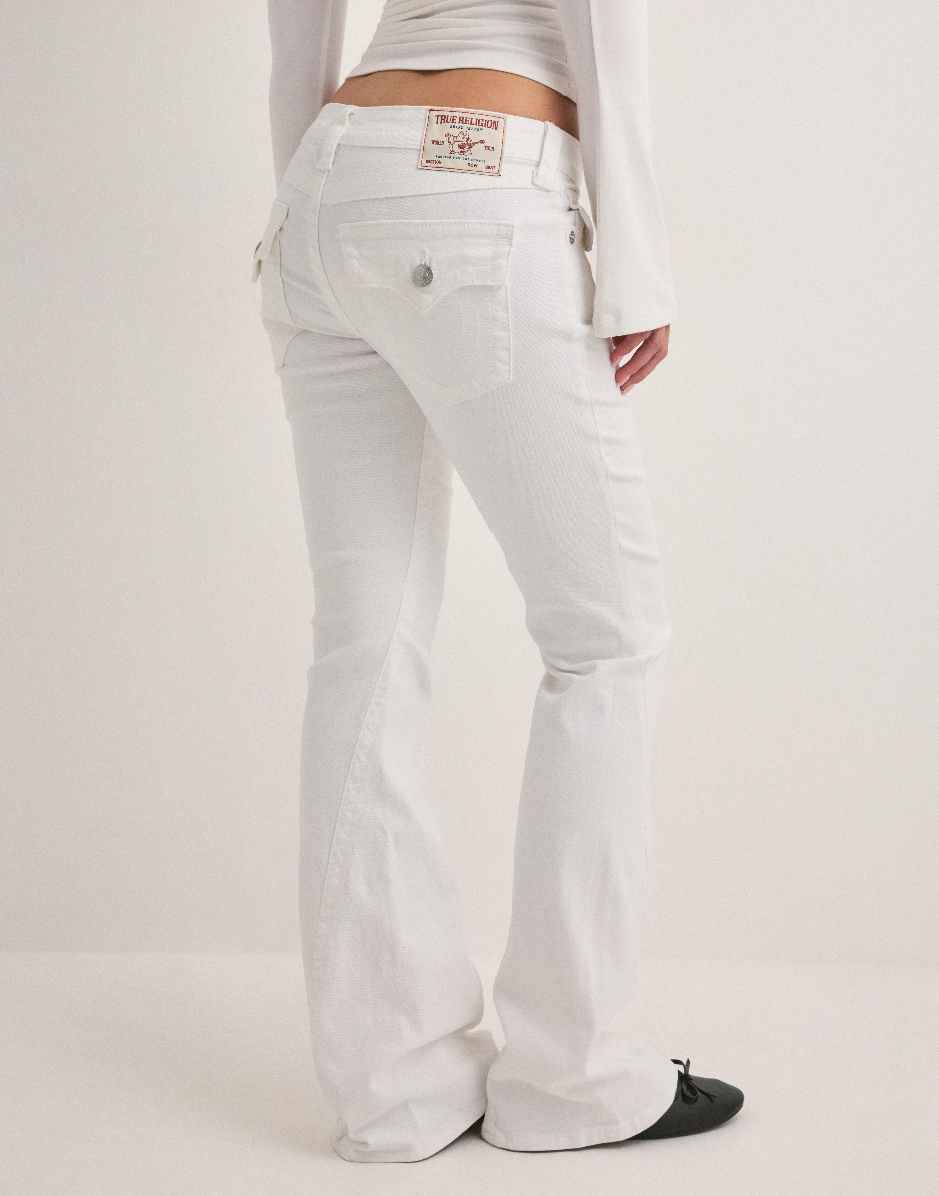 Buy True Religion Joey Lr Flare Flap_ - Brilliant White | Nelly.com
