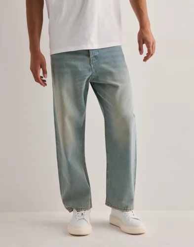 Blå loose fit jeans från Jack & Jones med femficksdesign