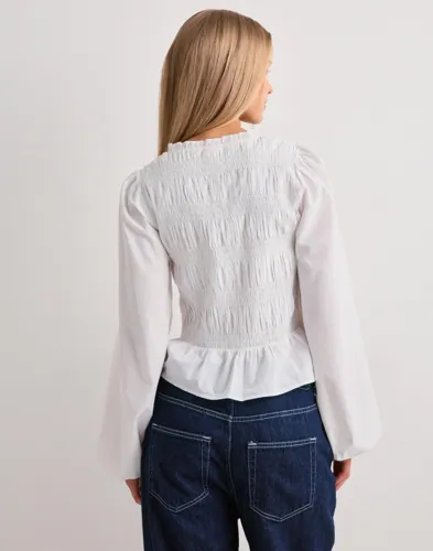Nelly Flirty V-neck Blouse blusar dam – bild 3
