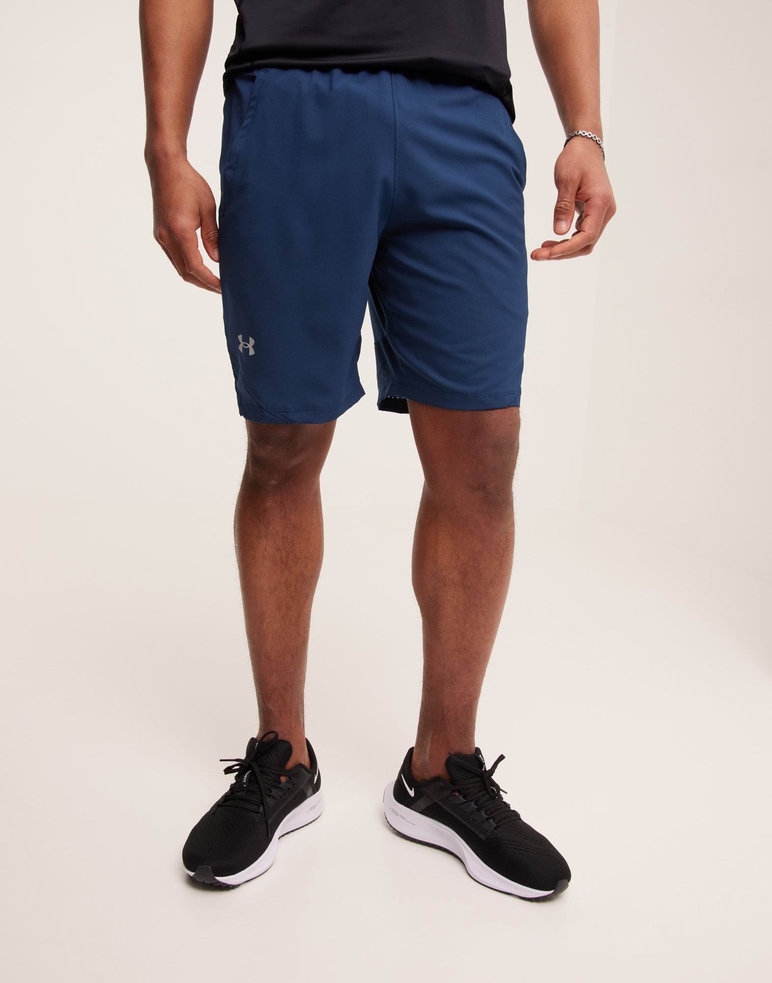 UA Vanish Woven 8in Shorts