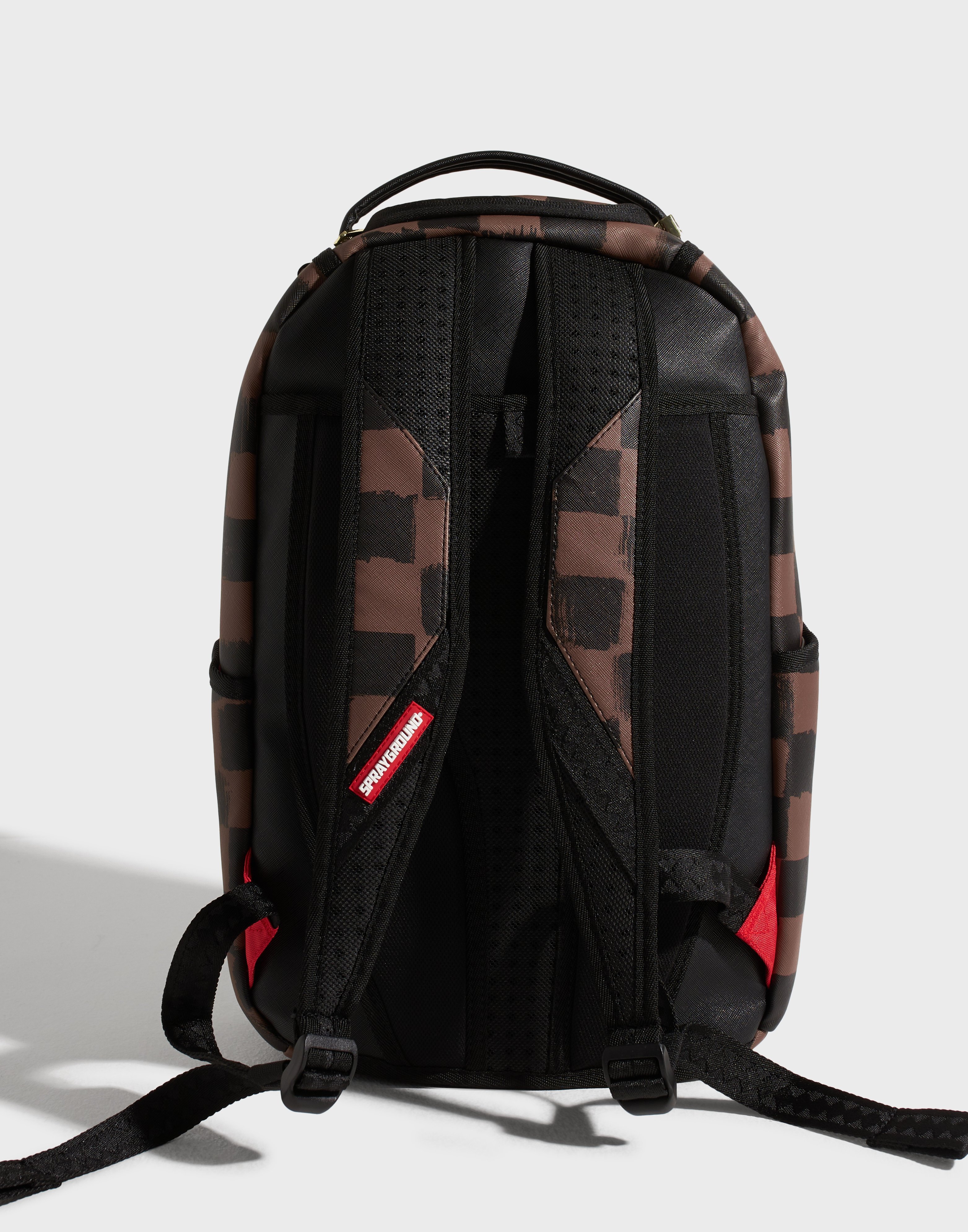 Sprayground checkered camo shark backpack hotsell