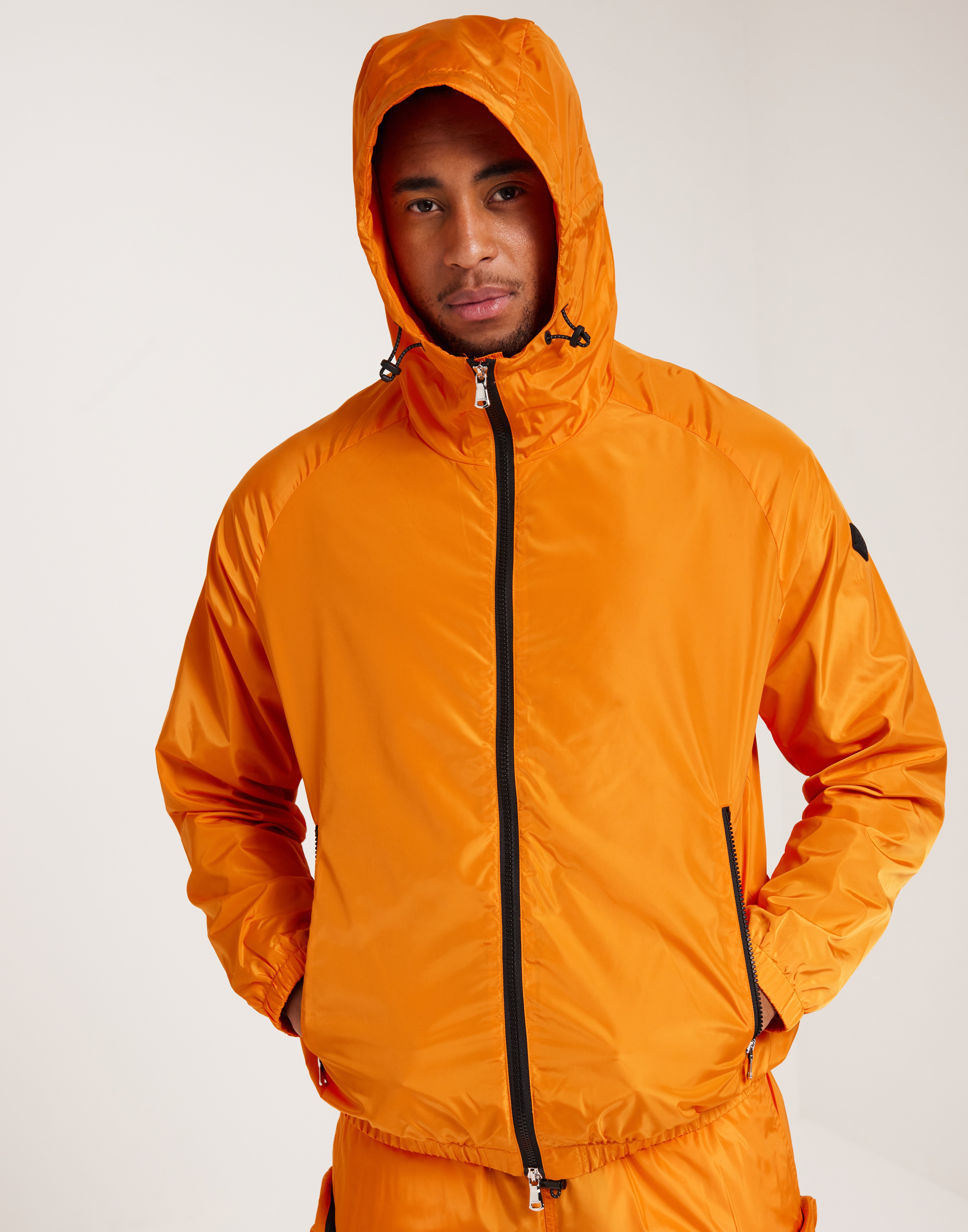 Buy J Lindeberg Trace solid Jacket - Orange | NLYMAN