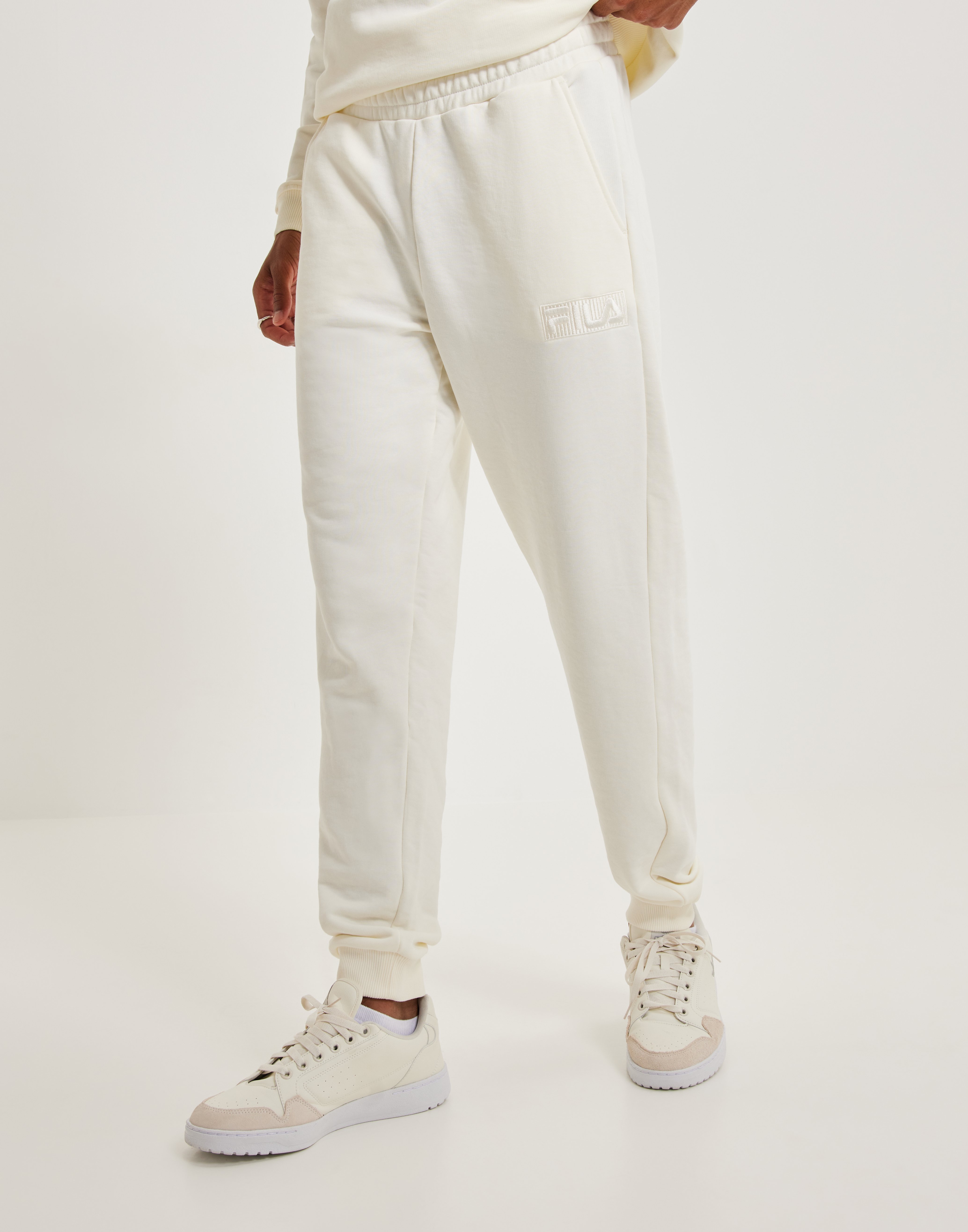 Fila white sweatpants best sale