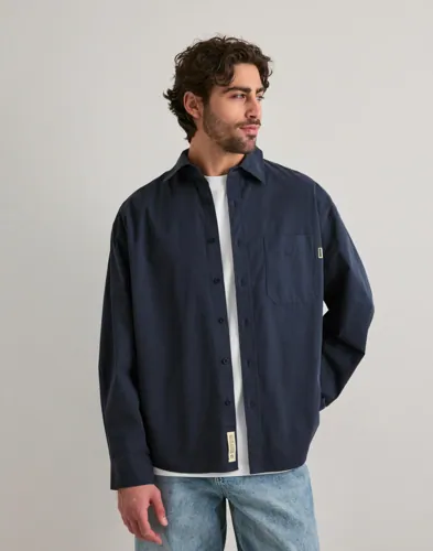Woodbird Jong blå overshirt i washed look