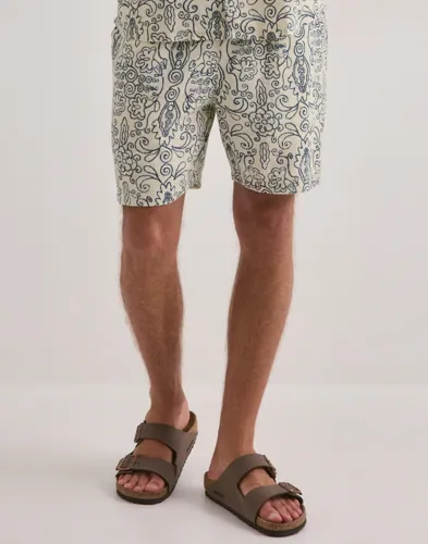 Solid shorts med resårmidja, dragsko och sidofickor