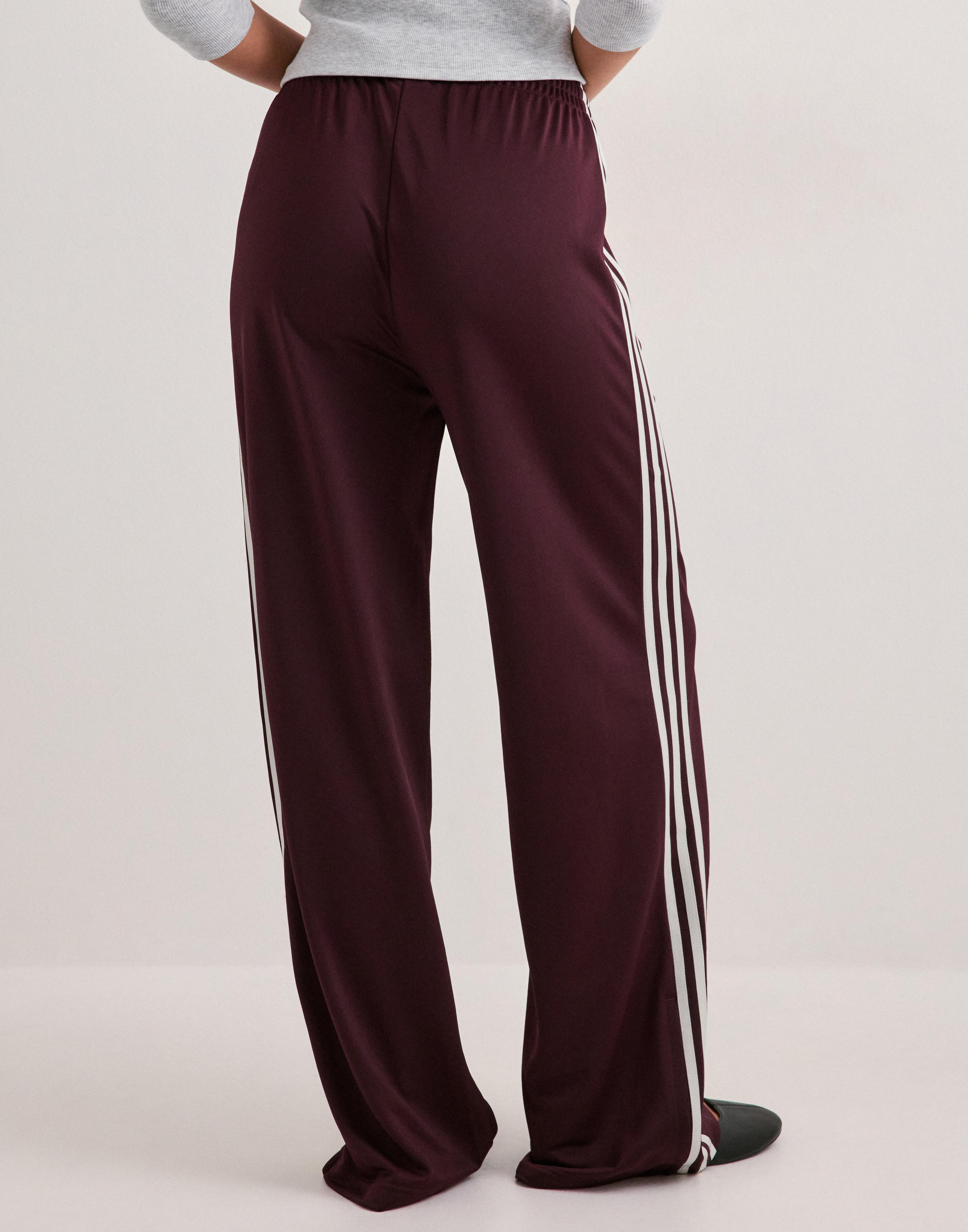 Adidas originals firebird tp i — byxor med fickor från Nelly