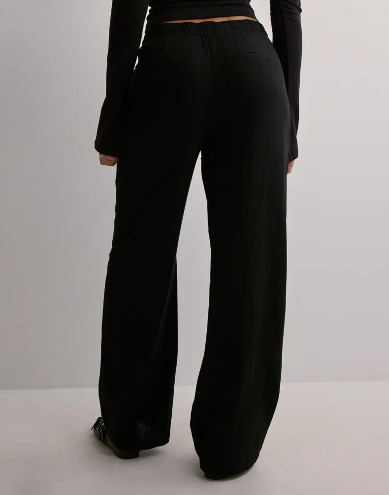 Buy Vero Moda VMJESMILO WIDE PANTS WVN GA NOOS Black
