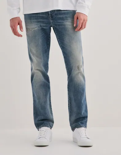 Diesel 1993 D-Vyl blå slim fit jeans med slitningar