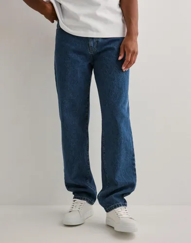 Blå loose fit-jeans från Woodbird med femficksdesign