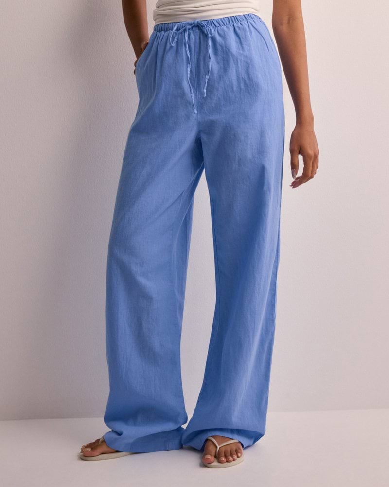 osta-gina-tricot-tall-linen-blend-trousers-light-blue-nelly