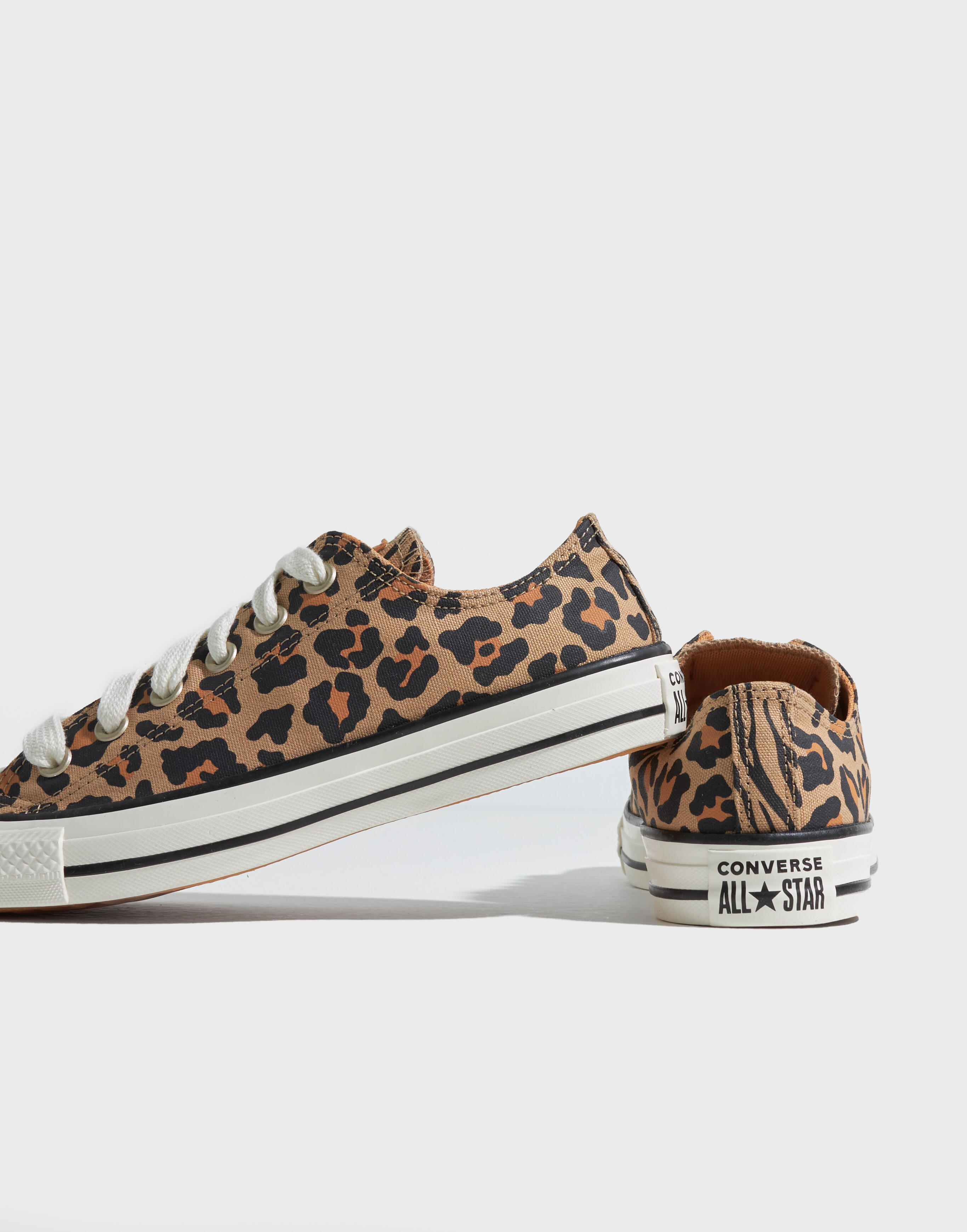 Chuck taylor animal print hotsell