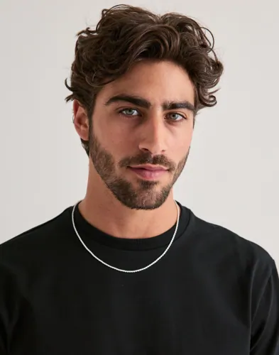 Silverfärgat Muli Collection-halsband med flätad repdesign