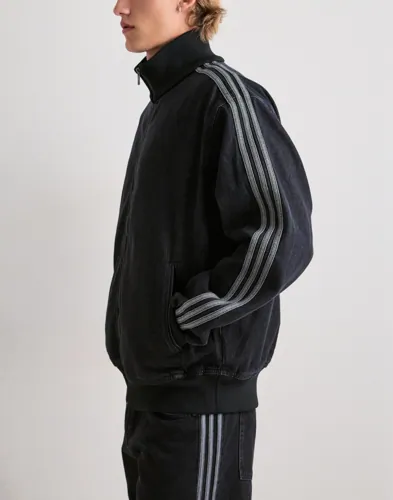 Adidas Originals trackjacka i svart denim med broderad logga