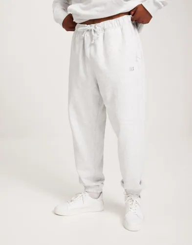 New Balance Athletics French Terry Jogger Träningsbyxor Grå