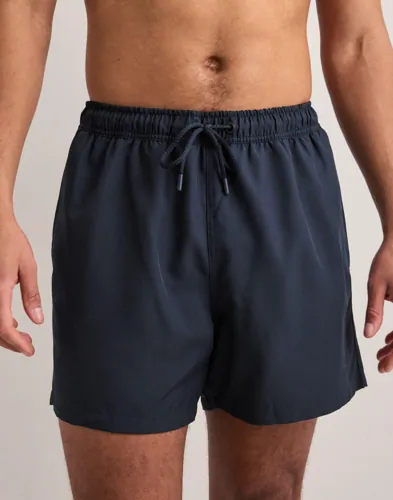 Björn Borg blå badshorts för herr med dragsko i midjan