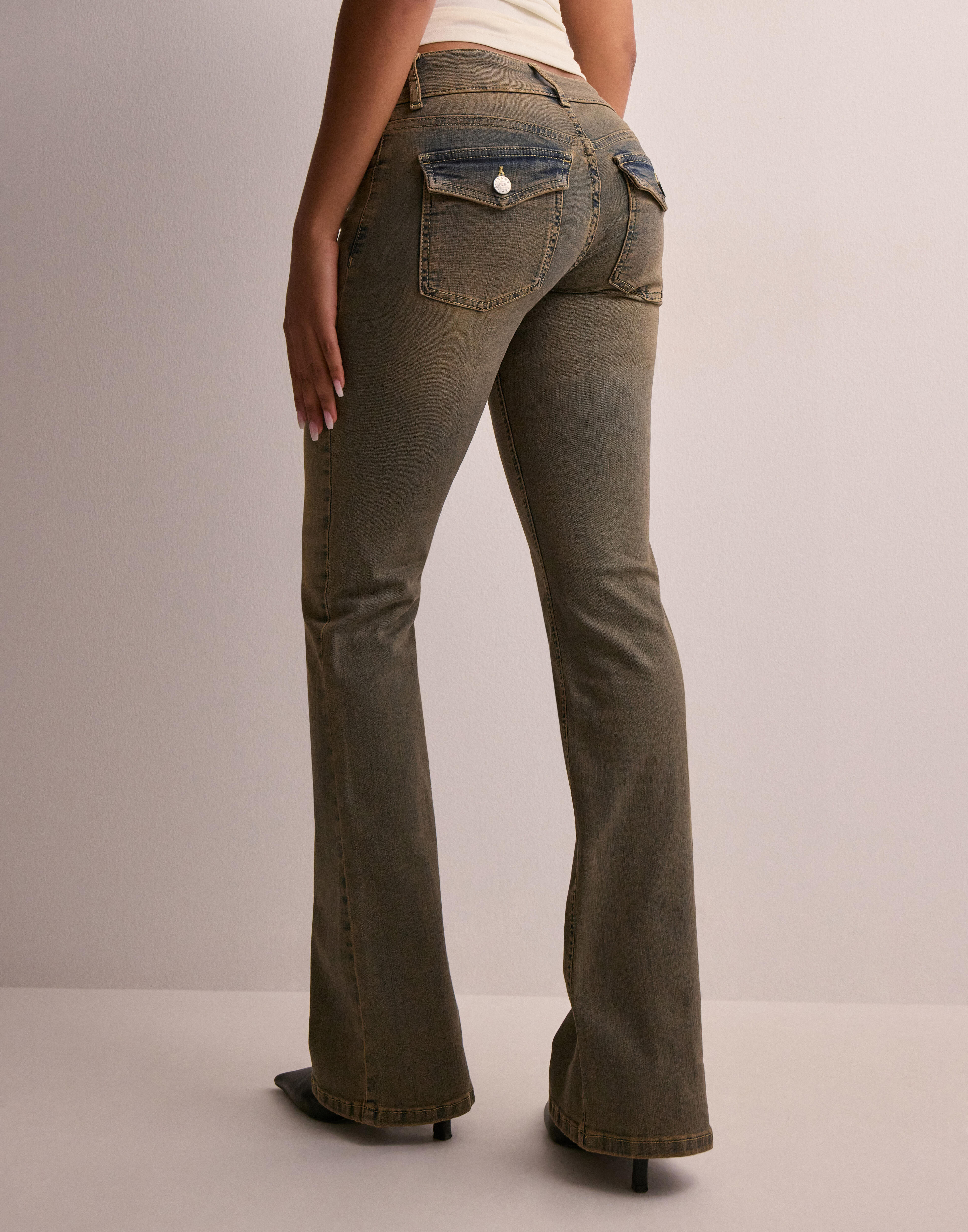 Jeans with flaps best sale