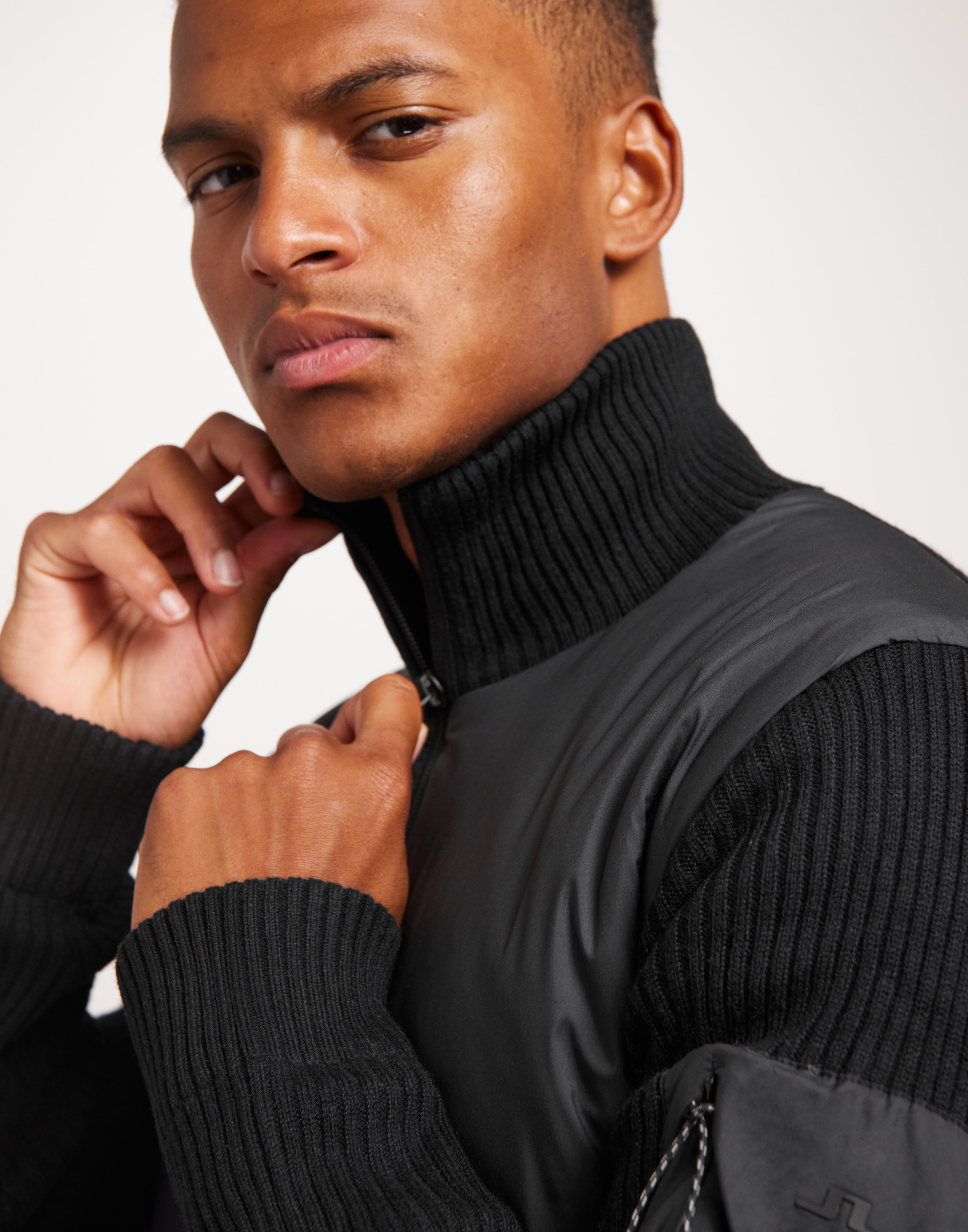 Buy J Lindeberg Beck Knitted Hybrid Jacket - Black | NLYMAN