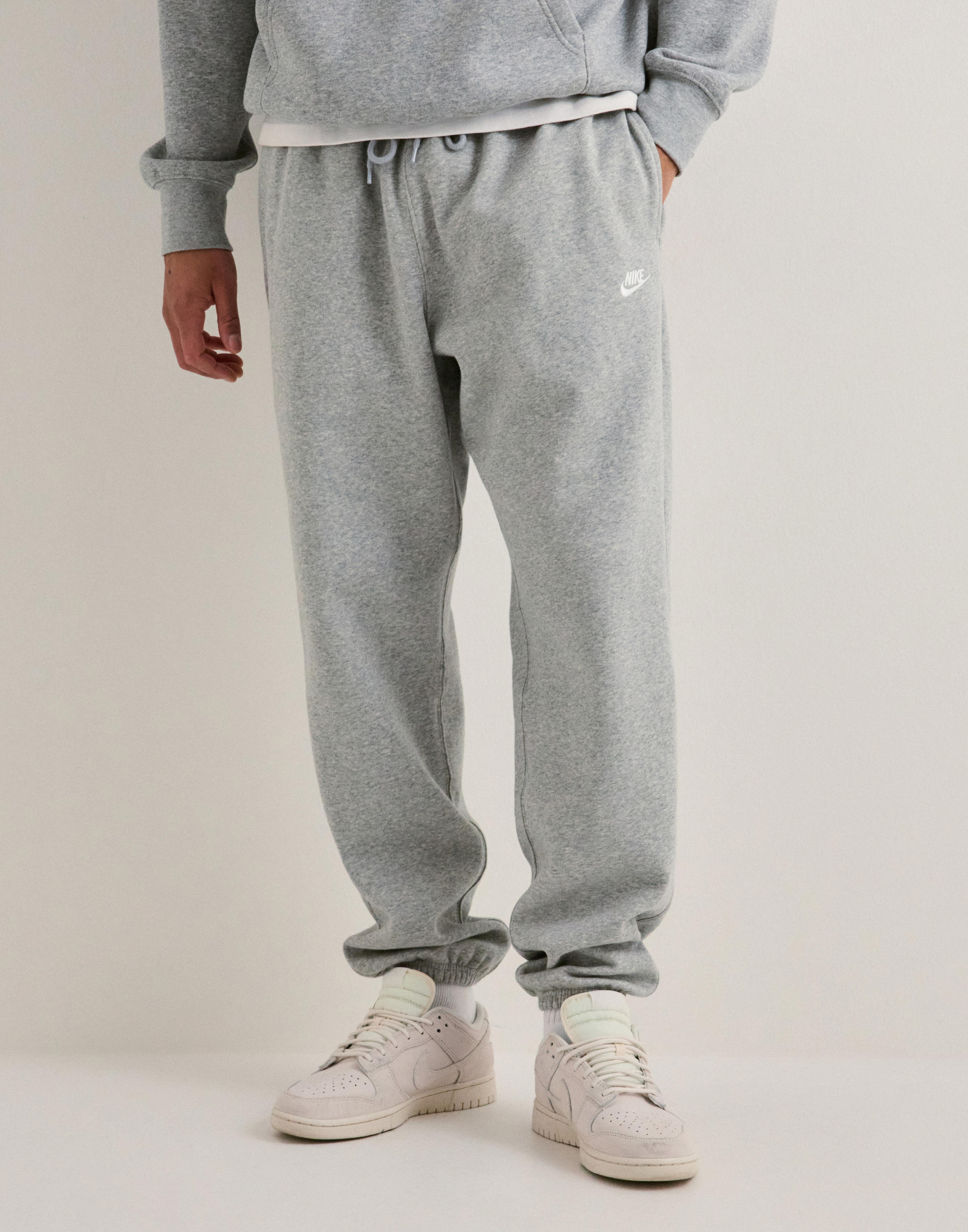 nike club cuffed joggers in dark grey