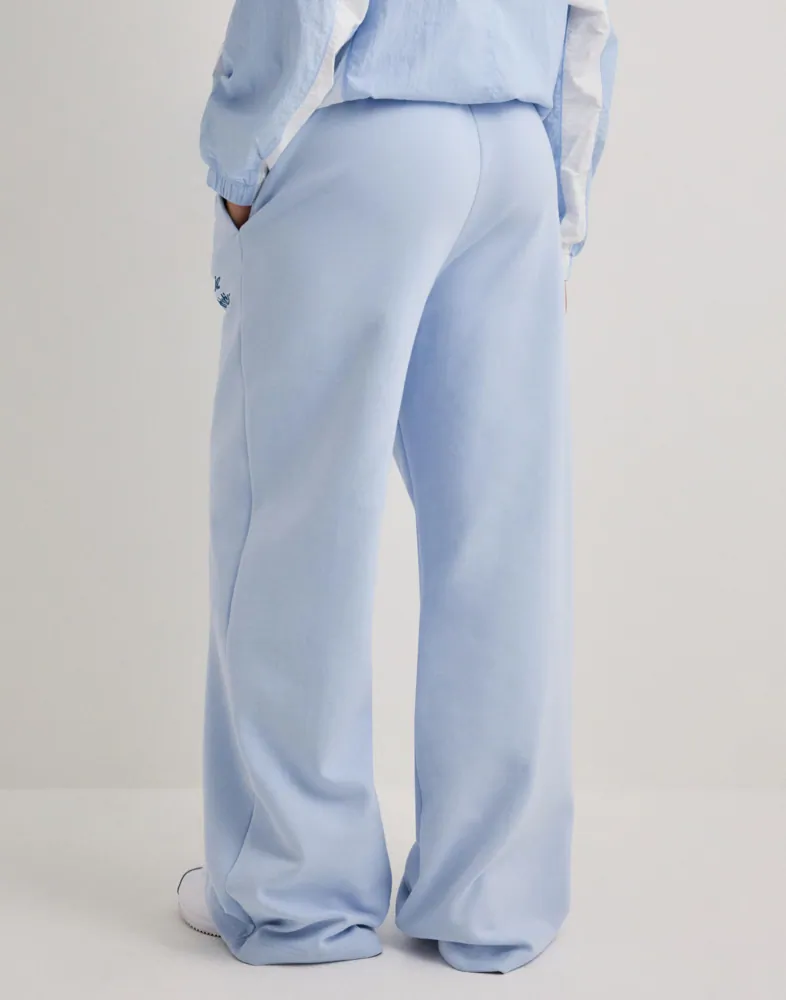 W Nk Phnx Flc Hr Pant Wd Gls