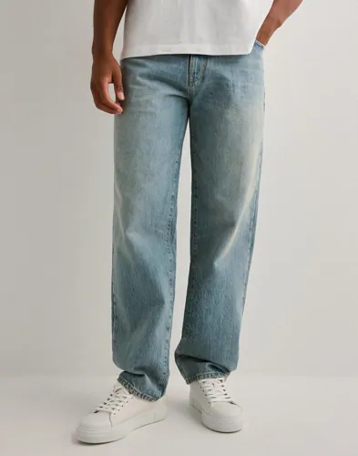 Blå Woodbird Leroy jeans i loose fit med femficksdesign