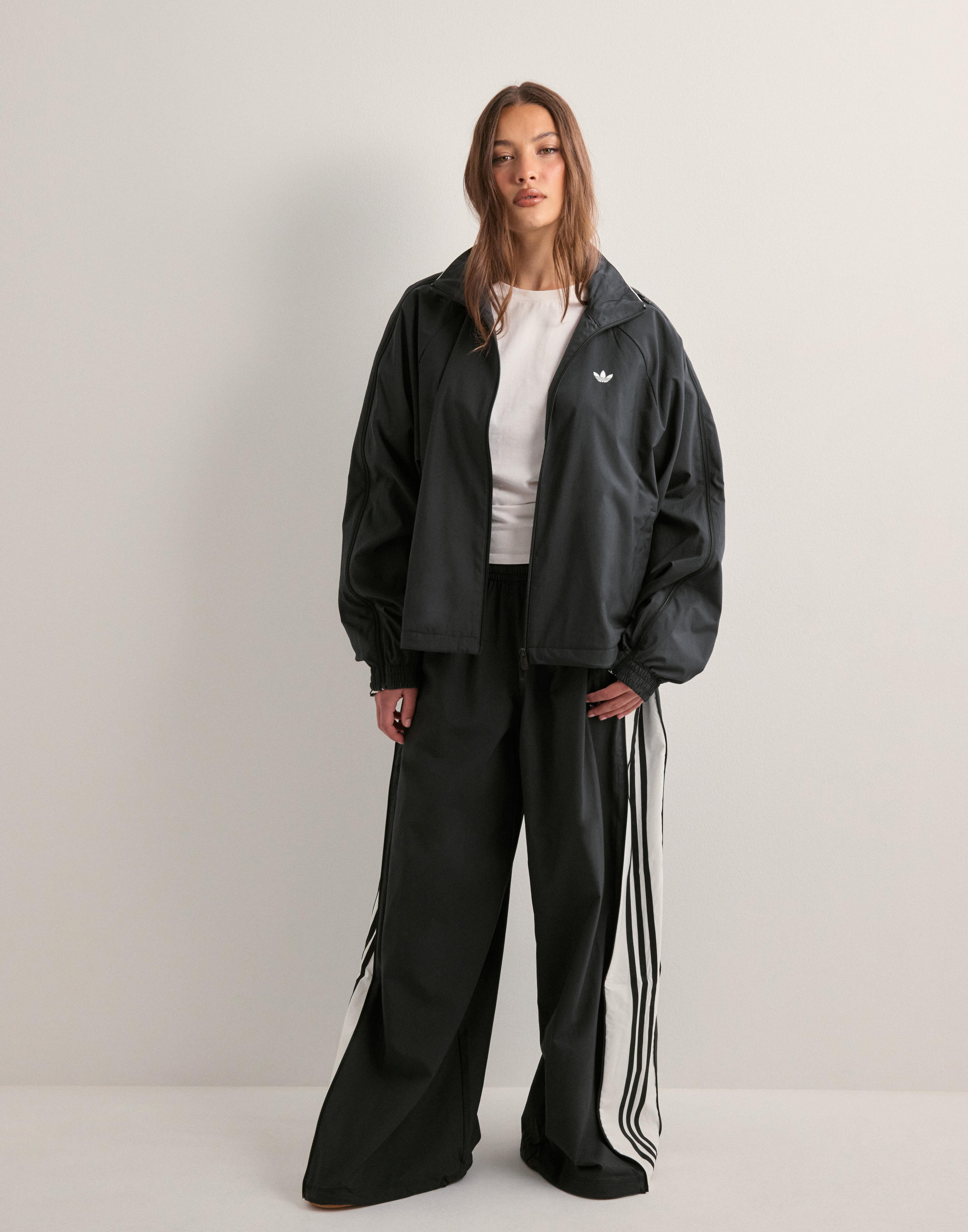 ジャケット・アウター WOVEN TT ZIP / adidas Originals Buy Adidas Originals WOVEN TT ZIP - Black | Nelly.com