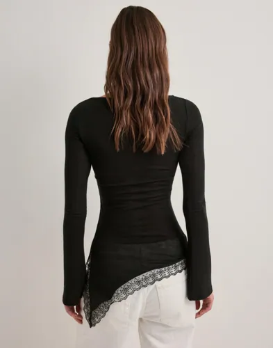 Nelly Soft Asymmetric Lace LS Top toppar dam – bild 3