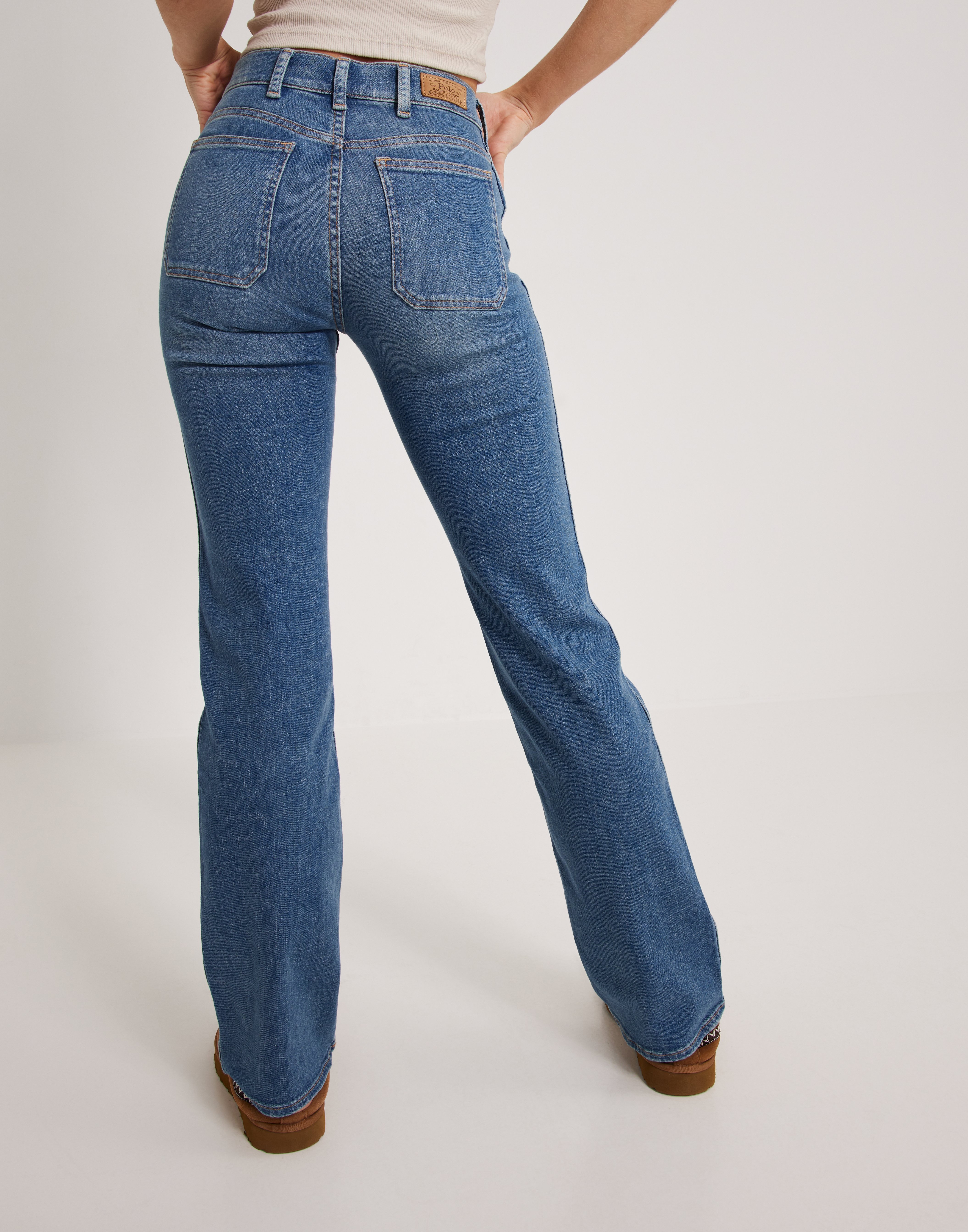 Köp Polo Ralph Lauren BOOT-STANDARD-FULL LENGTH-FLARE - Blue | Nelly.com