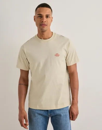 Beige t-shirt från Mads Nørgaard i bomull med broderad bröstlogga