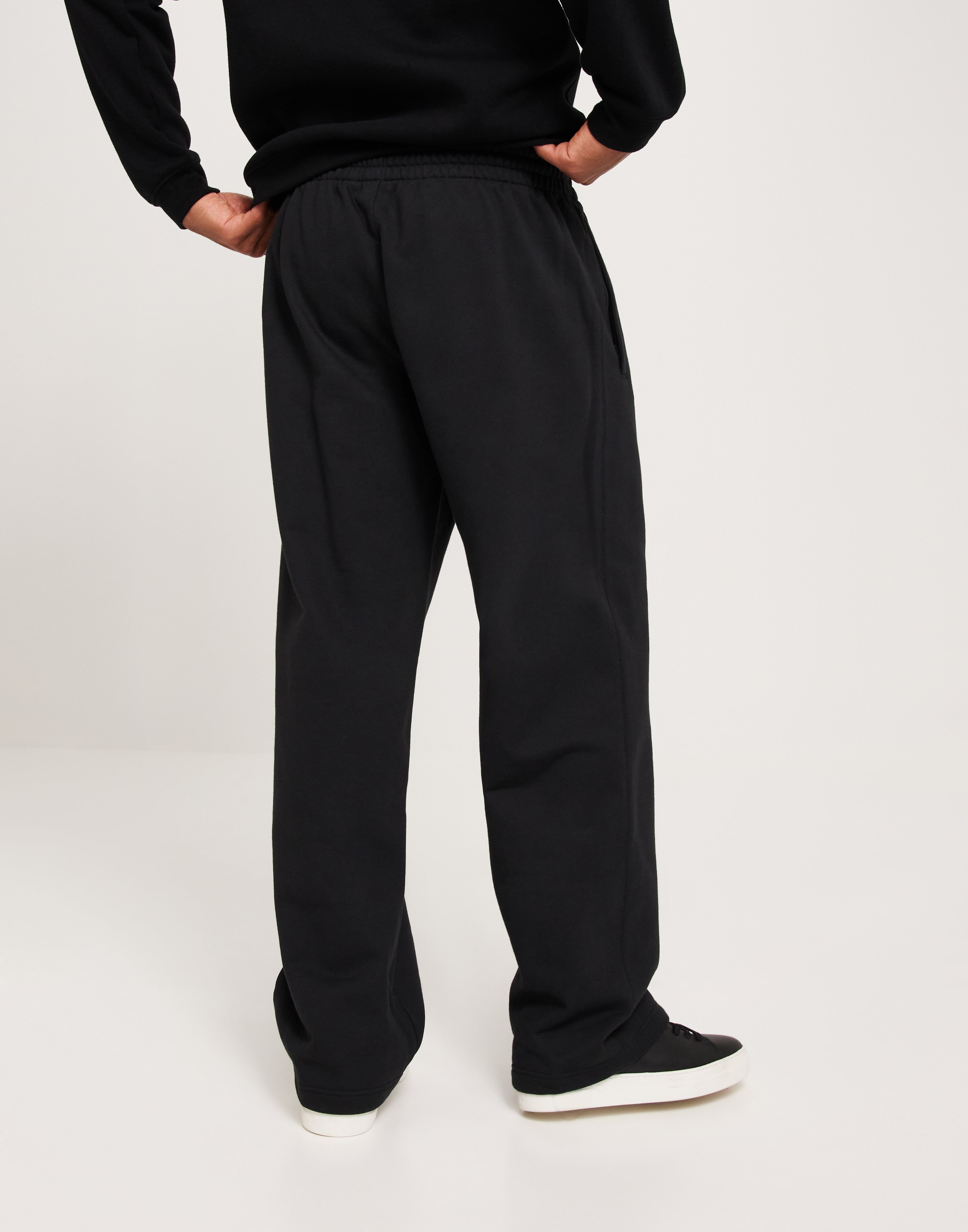 Buy Adidas Originals P ESS WIDE PANT - Black | NLYMAN Buy Adidas Originals P ESS WIDE PANT - Black | NLYMAN