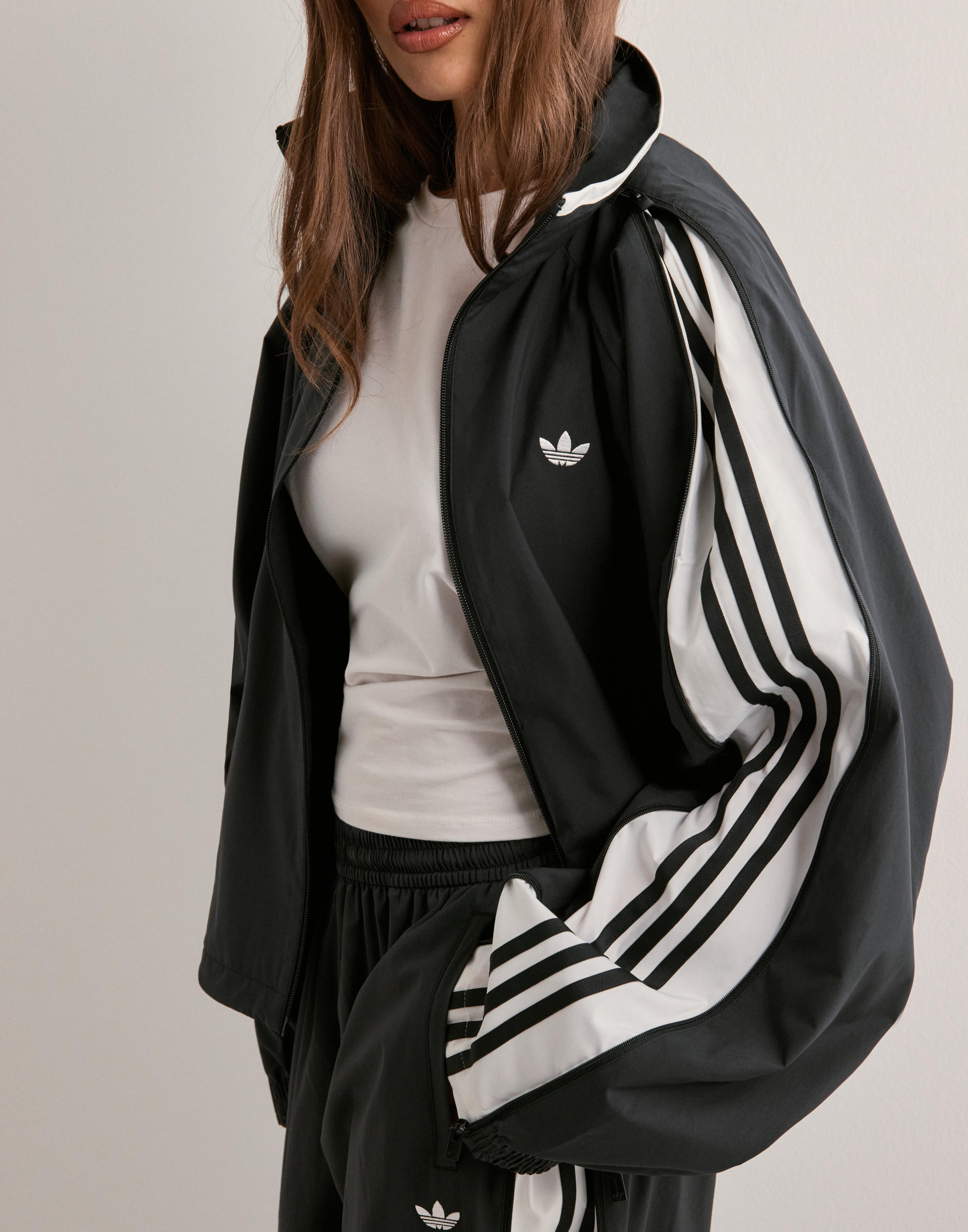 Buy Adidas Originals WOVEN TT ZIP - Black | Nelly.com