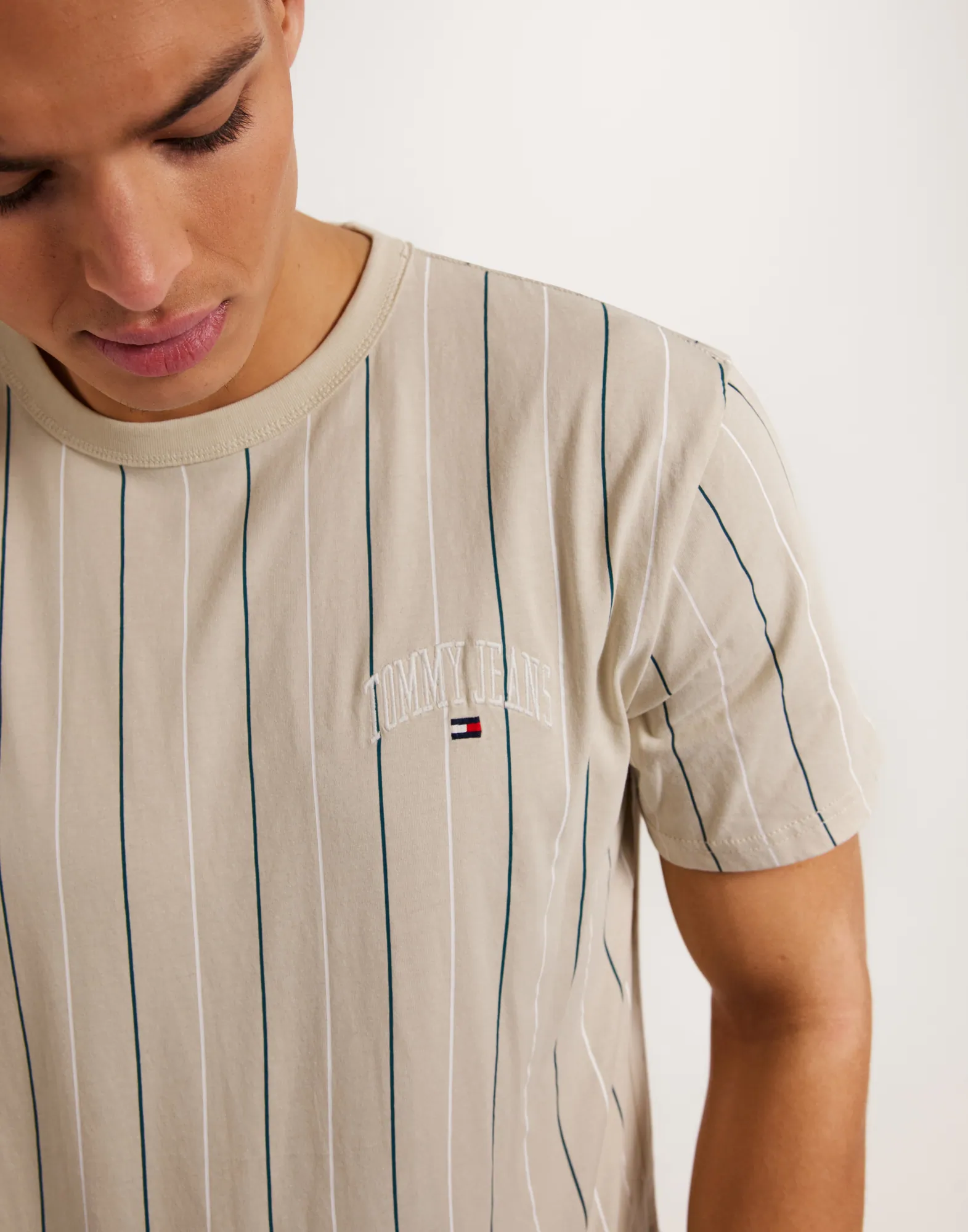 TJM REG VARSITY PINSTRIPE TEE