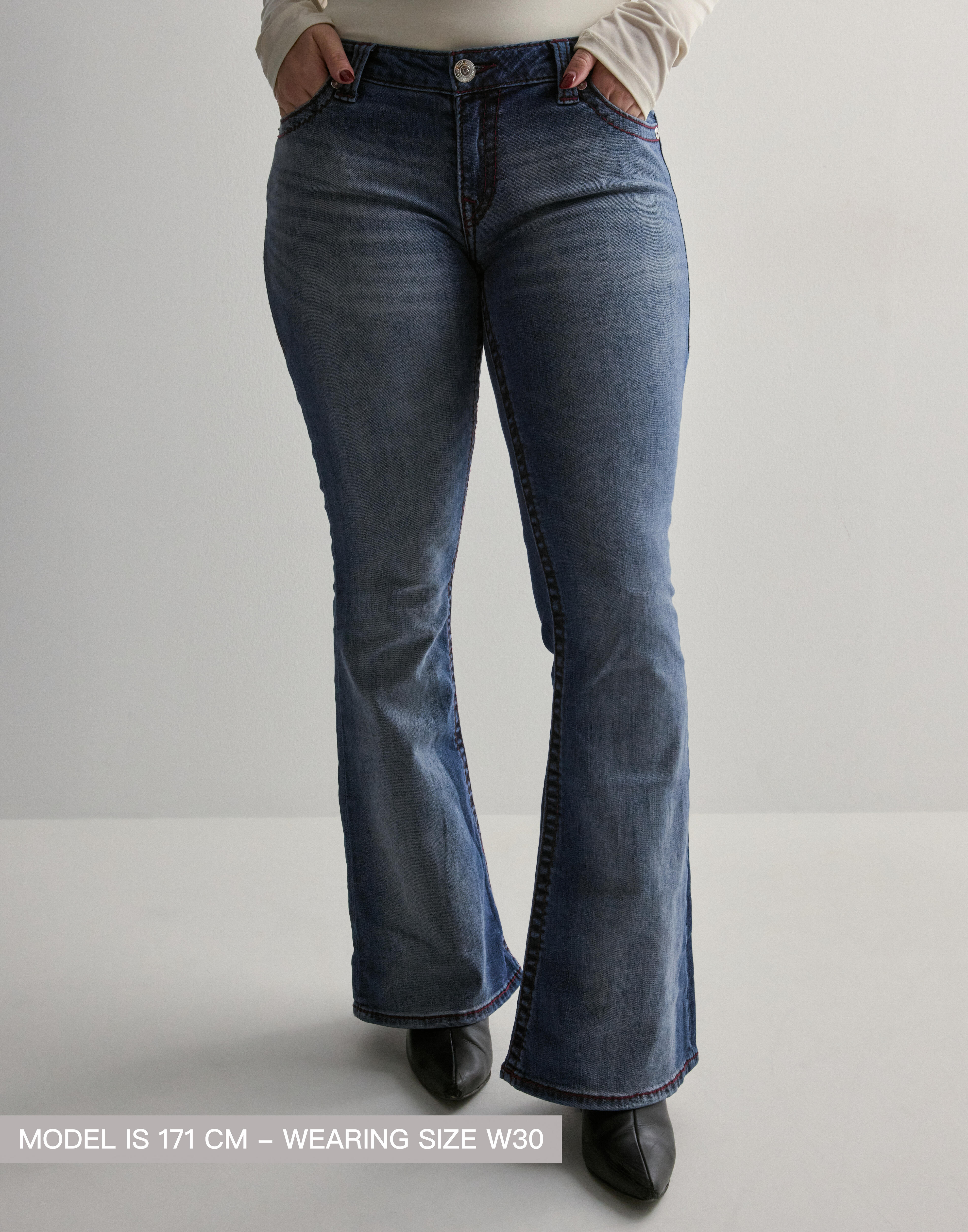 Buy True Religion NELLY ULTRA LOW RISE JOEY FLARE BIG T - KI25